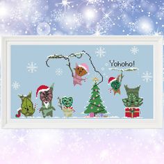 a cross stitch pattern with cats and christmas trees