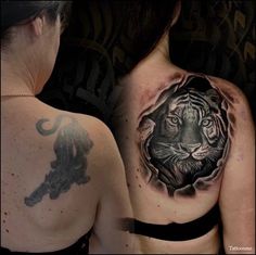 a woman with a tiger tattoo on her back