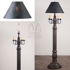 a lamp that is on top of a wooden floor next to a light pole with candles in it