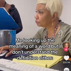 a woman sitting at a desk with a keyboard and mouse in front of her is the caption that reads, me looking up the meaning of a word but i don't