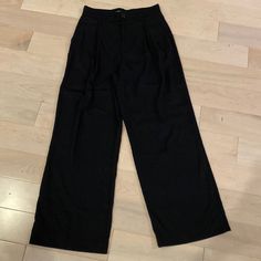 Soft Lyocell Blend Beautiful High Waist Wide Leg Pants In New Without Tags Condition Size Small Inseam Is 28” Waist Laying Flat Is 14” Zara Wide Leg Dress Pants For Work, Black Wide Leg Workwear Pants With Elastic Waistband, Black Wide Leg Pants With Elastic Waistband For Work, Black Wide Leg Pants For Work With Elastic Waistband, Zara Cotton Bottoms For Workwear, Black Relaxed Fit Dress Pants, Black Wide Leg Bottoms For Business Casual, Zara Wide Leg Pants With Elastic Waistband For Work, Zara Wide Leg Pants For Work With Elastic Waistband