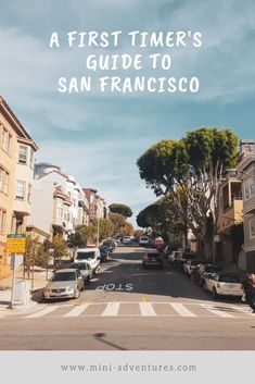 a street with cars parked on both sides and the words, a first timer's guide to san francisco