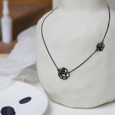 ✦ Embrace the romantic allure of our Roses Clavicle Necklace, featuring one small and one big rose pendant, available in either elegant gold or sleek black. Plated in luxurious 18K gold, this necklace exudes timeless charm and sophistication. Elevate your ensemble with the delicate beauty of roses, perfect for adding a touch of romance to any outfit.----------- DETAILS ------------ Color: Gold/ Black- Chain Length: 37cm- Materials: 18K Gold Plated, Titanium Steel- SKU: P541 Elegant Black Flower Pendant Necklace, Elegant Black Necklace With Flower Pendant, Delicate Black Necklace For Gift, Elegant Black Jewelry With Rose Design, Black Necklace With Rose Design As Gift, Black Necklace With Rose Design For Gift, Rose Choker, Delicate Beauty, Rose Pendant