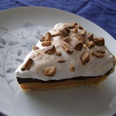 a piece of pie on a white plate