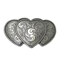 This unique trophy belt buckle displays 3 hearts with stunning inner designs and roped edges. Cast with fine detail in zinc, then carefully plated with a Sterling Silver finish, and then sealed with a clear finish to preserve the fine quality and finish. Buckle measures 4.25" x 3.5". It is meant for belts that measure up to 1.5" Luxury Silver Belt For Gift, Silver Concho Belt Buckles As Gift, Silver Engraved Belt For Gift, Silver Engraved Belt As Gift, Belt Buckle Display, 3 Hearts, Triple Heart, Silver Eagles, Belt Accessories