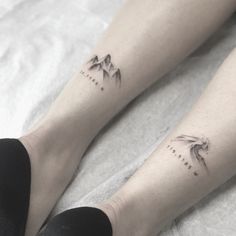 two people with tattoos on their legs and feet