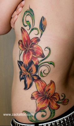 a woman's stomach with flowers on it