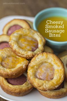 cheesy smoked sausage bites on a plate with dipping sauce