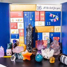 there are many different types of crystals on the table next to each other and numbers