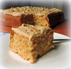 a piece of cake on a plate with a knife