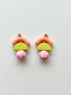 You just found some modern hand sculpted polymer clay earrings. They're great gift option for bridesmaids, birthdays or just for a fantastic woman in your life.  C A R E   I N S T R U C T I O N S  - store in a clean, dry place.  Use of oils, creams, perfumes etc may effect longevity. To clean polymer clay pieces, rub gently with a soft, wet piece of cloth. If you own a white or light colored pair of earrings and you get makeup stains on them, nail polish remover will clean it off.  Brass parts m Fun Pink Polymer Clay Earrings, Retro Adjustable Pink Earrings, Playful Polymer Clay Dangle Earrings, Modern Adjustable Polymer Clay Earrings, Modern Multicolor Polymer Clay Earrings, Pink Artsy Polymer Clay Earrings, Artsy Pink Polymer Clay Earrings, Handmade Retro Pink Earrings, Pink Retro Earrings For Gift