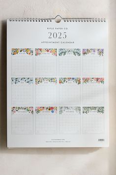 a calendar with floral designs on it