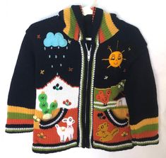 Landscape Arpillera Hooded Jacket for KidsThis lovely Arpillera jacket has been handmade with love by creative artisans in Lima, Peru.The jacket is embroidered with cotton. This amazing arpillera jacket is so warm and cozy.Arpillera is a patchwork that represents different landscapes and tells stories in a happy way.Size: 4 up to 3 years oldColor: Navy BlueMaterial: 25% Sheep wool and 75% acrylic<p>Washable cold water inside out/Hang dry</p><br/><p>Sleeves: 11" long</p Blue Embroidered Hooded Outerwear, Winter Cotton Outerwear With Multicolor Embroidery, Winter Multicolor Embroidered Cotton Outerwear, Casual Hand Knitted Cotton Outerwear, Handmade Long Sleeve Cotton Outerwear, Bohemian Handmade Hooded Outerwear, Handmade Bohemian Hooded Outerwear, Handmade Cotton Sweater For Winter, Handmade Cotton Winter Sweater