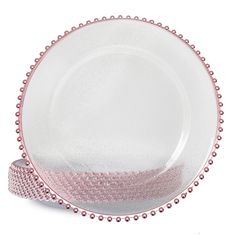 a pink and white plate with beaded edge