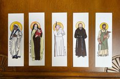 "Looking for simple gifts for any occasion? These bookmarks are small token that serve as a gentle reminder to strive to follow the examples of the saints. Each bookmark depicts a simple image of the saint on the front and their name, feast day and smaller image on the back. They are printed on quality 120lb cardstock and measure 2\" x 7\". These are perfect as they are but would be easy to have laminated if gifting a child.  What's available? - single bookmark - sets of 5 of one saint - sets if St Teresa, Catholic Decor, St John Paul Ii, Saint Teresa, Thérèse Of Lisieux, Catholic Kids, Pope John Paul Ii, All Saints Day, Bullet Journal Diy