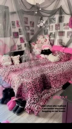 a pink and black bedroom with teddy bears on the bedspread, pillows and curtains