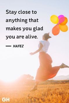 a woman running through a field with balloons in her hand, saying stay close to anything that makes you glad you are alive