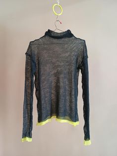 Black merino knitted unisex transparent sweater. Black and neon yellow. Very soft feel, lightweight and sweater to clean. Knitted from Italian  merino wool -E. Miroglio. 50% WV Merino wool 50% PC polyacrylic fibre Size -M wide - length- Machine washing at 30* [86F] or hand washing Tumble drying and dry cleaning are not recommended. Comes with a bag designed for protective washing in the washing machine. Please keep away from rings, watches and other accessories on which it can be attached. Hand Transparent Sweater, Mesh Sweater, Merino Sweater, Sweater Oversized, Casual Black, Black Sweater, Knitted Sweater, Neon Yellow, Wabi Sabi