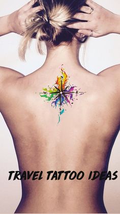 the back of a woman's neck with a colorful tattoo on it