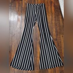 Never Worn. In Excellent Condition Chic Stretch Bottoms With Vertical Stripes, Trendy Black Bottoms With Vertical Stripes, Spring Black Bottoms With Contrast Stripes, Black Bottoms With Contrast Stripes For Spring, Black Pants With Contrast Stripes For Spring, Black Pants With Vertical Stripes For Summer, Stretch Pants With Vertical Stripes For Spring, Black Spring Bottoms With Striped Hem, Spring Black Bottoms With Striped Hem