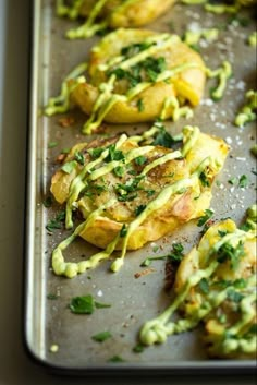 some food is sitting on a baking sheet