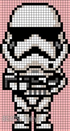 a cross stitch star wars trooper is shown in black and white, with pink background