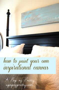 a bed with white pillows and a blue sign above it that says how to paint your own inspirational canvass