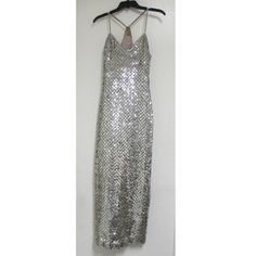 Vintage 80's Silver Sequined Formal Party Long Evening Gown Dress Clear Rhinestone Straps Worn Approximately 1985 - 1992. This Is A Very Strong And Well-Made Dress In A Style That Is Timeless. I Believe It Was Actually Custom Made But I Do Not Know Where. You Can See In The Photo That The Lining Is Hand Stitched. It Is A Very Heavy Weighted Garment. The Zipper Is Working Fine. The Sequins Appear To Be In Good Condition. I Took The Measurements Which Are As Follows: Waist: 28" Hips: 36” Bust 30" Slit: 21" From The Center Of Front To Bottom Of Dress 45.5" From The Back Of Neck To Bottom Of Dress 50" Length Of Straps On Each Side - One Is 11" & The Other Is 12" The Material Under The Sequin Evening Gown Dresses, Long Evening Gowns, Gown Dress, Formal Party, 50's Dress, Evening Gown, Hand Stitched, Vintage Outfits, Colorful Dresses