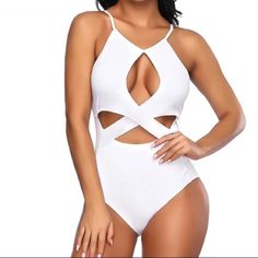 White Swimsuit New With Tags. . Perfect For Going To The Pool Or Beach. Elegant Cutout Bodysuit For Beach, Elegant Cutout Bodysuit For The Beach, White One Piece For Beach Party, Chic White One Piece For Poolside, White Beach Party One Piece, White Beach Party One-piece, White Party One Piece For Beach Season, White Cutout Swimwear For Party, Chic Cutout Bodysuit For The Beach