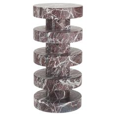 a marble side table with three tiers on each end and one section in the middle