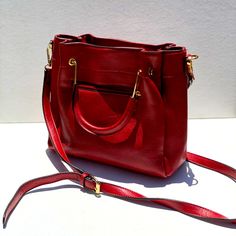 Excellent Condition.. Never Used Red Leather Cross Body Bag. No Signs Of Wear Red Everyday Satchel Shoulder Bag, Red Shoulder Bag Satchel For Everyday Use, Chic Red Satchel For Errands, Red Shoulder Bag With Detachable Strap For Daily Use, Trendy Red Soft Leather Bags, Formal Red Soft Leather Shoulder Bag, Everyday Red Satchel With Double Handle, Everyday Red Double Handle Satchel, Red Crossbody Shoulder Bag For Errands