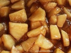 close up view of cooked potatoes with brown sauce