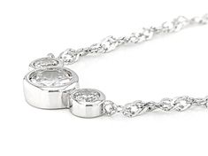 Bella Luce® white diamond simulant 1.14ctw round, platinum over sterling silver necklace. Measures approximately 18" L x 0.64" W. Has a singapore chain that includes a 2" extender and lobster claw clasp closure. The diamond equivalent weight is 0.69ctw. Silver Solitaire Necklace With Diamond Accents In Platinum, Silver Platinum Solitaire Necklace With Diamond Accents, Platinum Diamond Necklace With Bezel Setting In Silver, Silver Diamond Necklace With Bezel Setting For Anniversary, Silver Platinum Diamond Necklace With Bezel Setting, White Cubic Zirconia Jewelry With Bezel Setting, Silver Diamond Necklace With Bezel Setting, Anniversary Diamond Solitaire Necklace With Polished Finish, Diamond Solitaire Necklace With Polished Finish For Anniversary