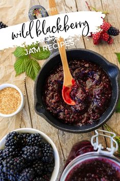 blackberry jam recipe in a cast iron skillet with berries and seasoning on the side