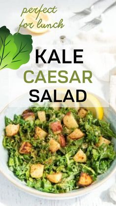 kale caesar salad in a bowl with lemon wedges and parsley on the side