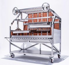 a metal cart with books on top of it