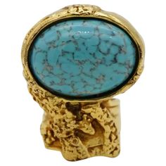 Yves Saint Laurent YSL Vintage Arty Turquoise Statement Enamel Stone Chunky Ring, Size 6, Gold Plated Very excellent condition. Very light scratches and colour loss, barely noticeable. 100% genuine. Vintage. Come with original pouch and box. Signed on the back YSL, Made in France. UK size: L / M. _ _ _ Great for everyday wear. Come with velvet pouch and beautiful package. Makes the perfect gift for Teens, Sisters, Friends, Girlfriends, Birthdays, Anniversaries, Mother’s Day, Valentine’s Day, Christmas and many more. With exquisite fine detail, these fashion jewellery are ideal for a glamorous look. Ideal for a splendid gift or an eye-catching jewellery for your everyday outfit. Also don't forget to look through my other listings, I have so many more beautiful jewellery waiting for you. _ _ Ysl Vintage, Chunky Ring, Blue Tourmaline, Chunky Rings, Oval Ring, Oval Rings, Candle Shop, Vintage Jewellery, San Valentino