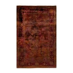 an antique rug with red and brown colors