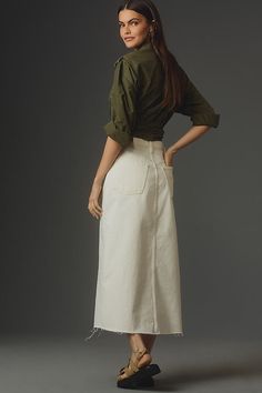 100% cotton Front slant pockets Back patch pockets Front zip Machine wash USA | The Midaxi Raw-Hem Denim Midi Skirt by FRAME in White, Women's, Size: 24, Cotton at Anthropologie High Waist Cotton Skirt With Relaxed Fit, Fitted Cotton Denim Skirt With Pockets, Relaxed Fit Cotton Denim Long Skirt, Fitted Cotton Utility Denim Skirt, Fitted Utility Cotton Denim Skirt, Relaxed Fit Cotton Skirt With Pockets, Cotton Long Denim Skirt Relaxed Fit, Fitted High-rise Cotton Cargo Skirt, Fitted High Rise Cotton Cargo Skirt