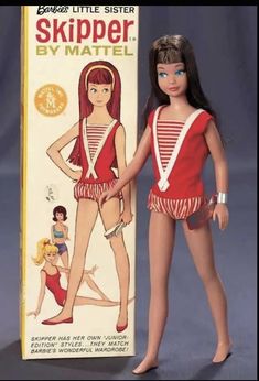 the doll is wearing a red and white swimsuit with stripes on it's sides