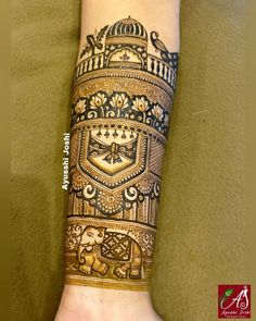 the arm is decorated with intricate designs