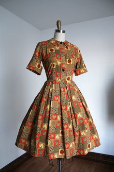 Super adorable cotton shirtwaist dress from the late 1950s. This dress features a random fun print of apples and roosters!! Label: Connie Sag???  Measurements: { small } Bust: 36"  Waist: 26"  Hips: open Length: 39" Sleeve Length: 12.5" unrolled Condition: excellent vintage condition with minor signs of wear - sold as found. washed and ready to wear - maybe a hint of discoloration in a couple of the novelties as shown. ☆Shop☆ http://www.trunkofdresses.com/ 1950s Shirtwaist Dress, Housewife Dress, 1950 Style, 1960s Dresses, 1950 Fashion, Fashion 1950s, Shirtwaist Dress, 1950s Style, 20 Off Sale