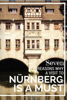 an old building with a white frame over it that says seven reasons why a visit to nurberg is a must