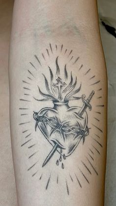 Sacred heart tattoo, anterior forearm tattoo, religious tattoo Sacred Heart Art Tattoo, The Sacred Heart Tattoo, Joan Of Arc Tat, Saint Tattoo Female, Mexican Sacred Heart Tattoo, Sacred Heart Stencil, Corazon Sagrado Tattoo, Tattoo For God, Monstrance Tattoo