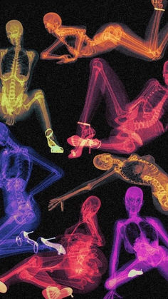 an x - ray image of people sitting in different colors