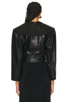 Find FRAME Cropped Belted Leather Jacket on Editorialist. FRAME Cropped Belted Leather Jacket in Black Self: 100% lamb leather Lining: 50% polyester 50% viscose. Made in Turkey. Professional leather clean only. Singular front button closure. Waistbelt at hem with buckle closure. FAMF-WO28. WW23LJA022. About the designer: Swedish entrepreneurs Jens Grede and Erik Torstensson joined forces in 2012 with the intention of designing the ideal pair of jeans. FRAME Denim was born, and has defined California chic ever since. Inspired by the fashion industry's “off duty” aesthetic, the label was quickly embraced by It Girls and lauded as an accessible global luxury brand. Today, Frame has expanded from handcrafted denim to ready to wear staples in the finest natural materials. Based in Los Angeles, Fitted Leather Jacket With Padded Collar For Fall, Chic Spring Biker Jacket With Padded Collar, Chic Leather Jacket With Padded Collar, Luxury Leather Cropped Jacket For Fall, Spring Evening Leather Jacket, Luxury Fall Biker Jacket With Padded Collar, Elegant Leather Cropped Jacket For Fall, Luxury Cropped Jacket For Evening In Fall, Chic Fitted Biker Jacket For Evening