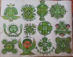 an old book with green designs on it and some people's faces in the middle