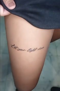 a woman's thigh with the word love your best friend written in cursive writing