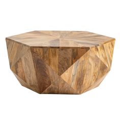 a wooden table that is made out of wood and has geometric designs on the top