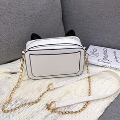 #SS0520 Material: PU Color: black, white Size: 19cm*12cm*7cm Shoulder strap length: 120cm Shipping: Free Shipping Worldwide for order over 15$, 7-15 days delivery to US/UK/CA/AU/FR/DE/IT and most Asia Countries Trendy White Shoulder Bag, Trendy White Rectangular Phone Bag, Trendy White Phone Bag With Adjustable Strap, Trendy White Bag With Cat Design, Trendy White Phone Bag With Zipper, White Casual Bags As Fashion Accessory, Trendy White Phone Bag With Zipper Closure, White Rectangular Shoulder Bag With Cat Design, Casual White Shoulder Bag With Cat Design